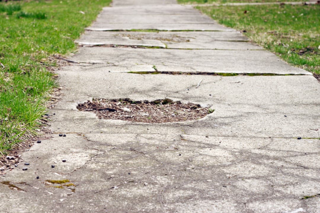 DOT pothole cracked sidewalk