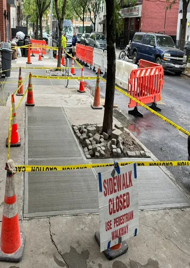 repair sidewalk in queens